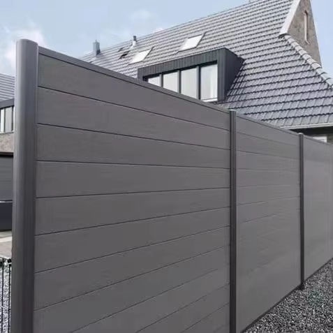 Houses divided with WPC fencing Houses divided with WPC fencing